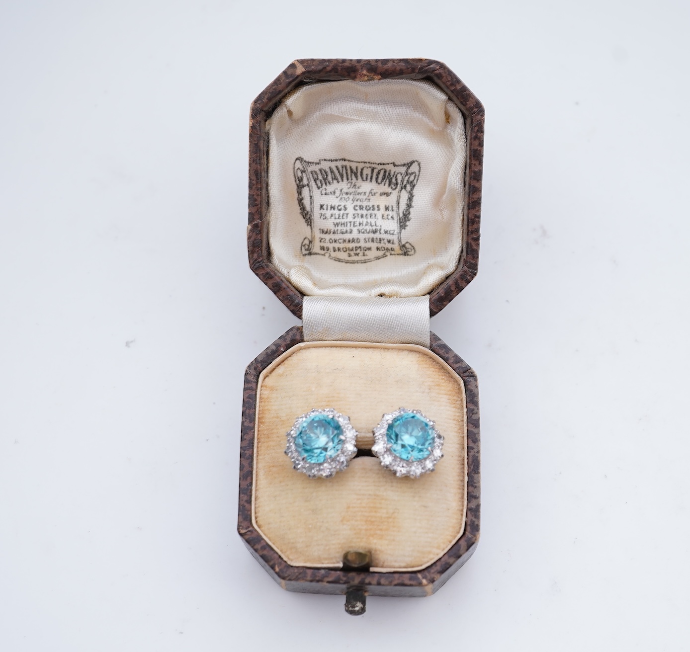 A pair of zircon and diamond earrings, mid 20th century